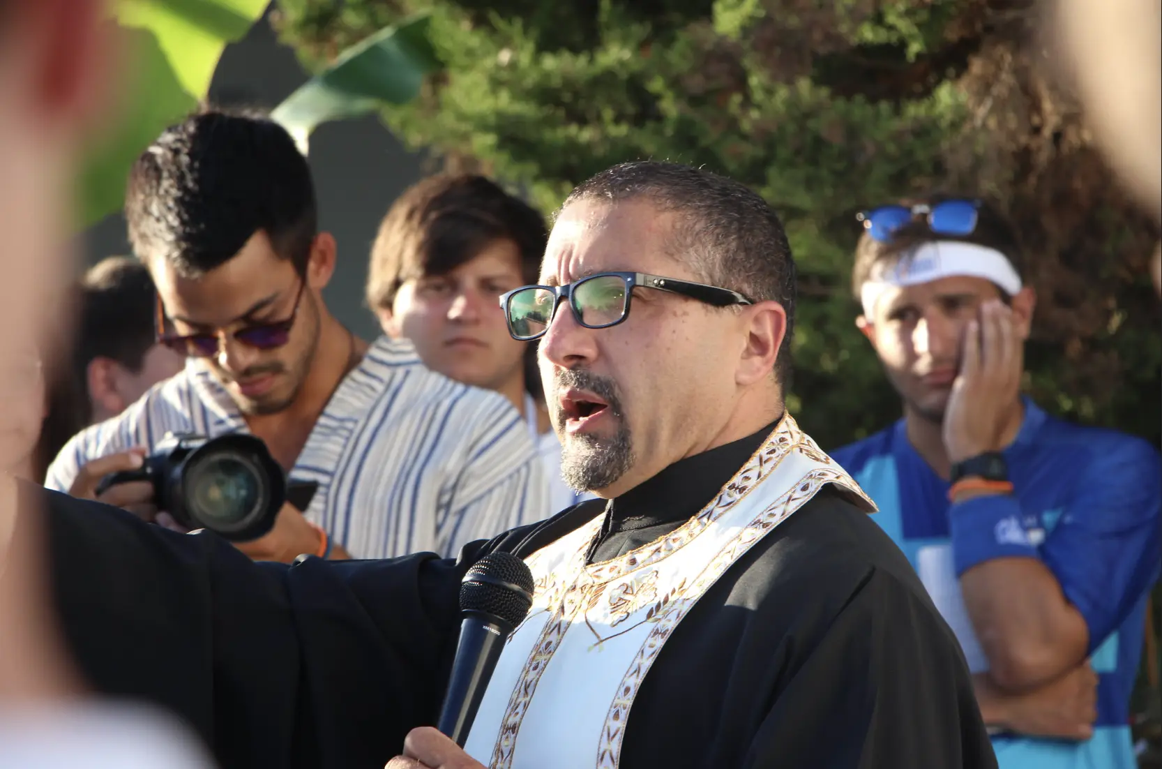 Multiple priests attend camp to advise young Greeks about their spiritual growth and healing.