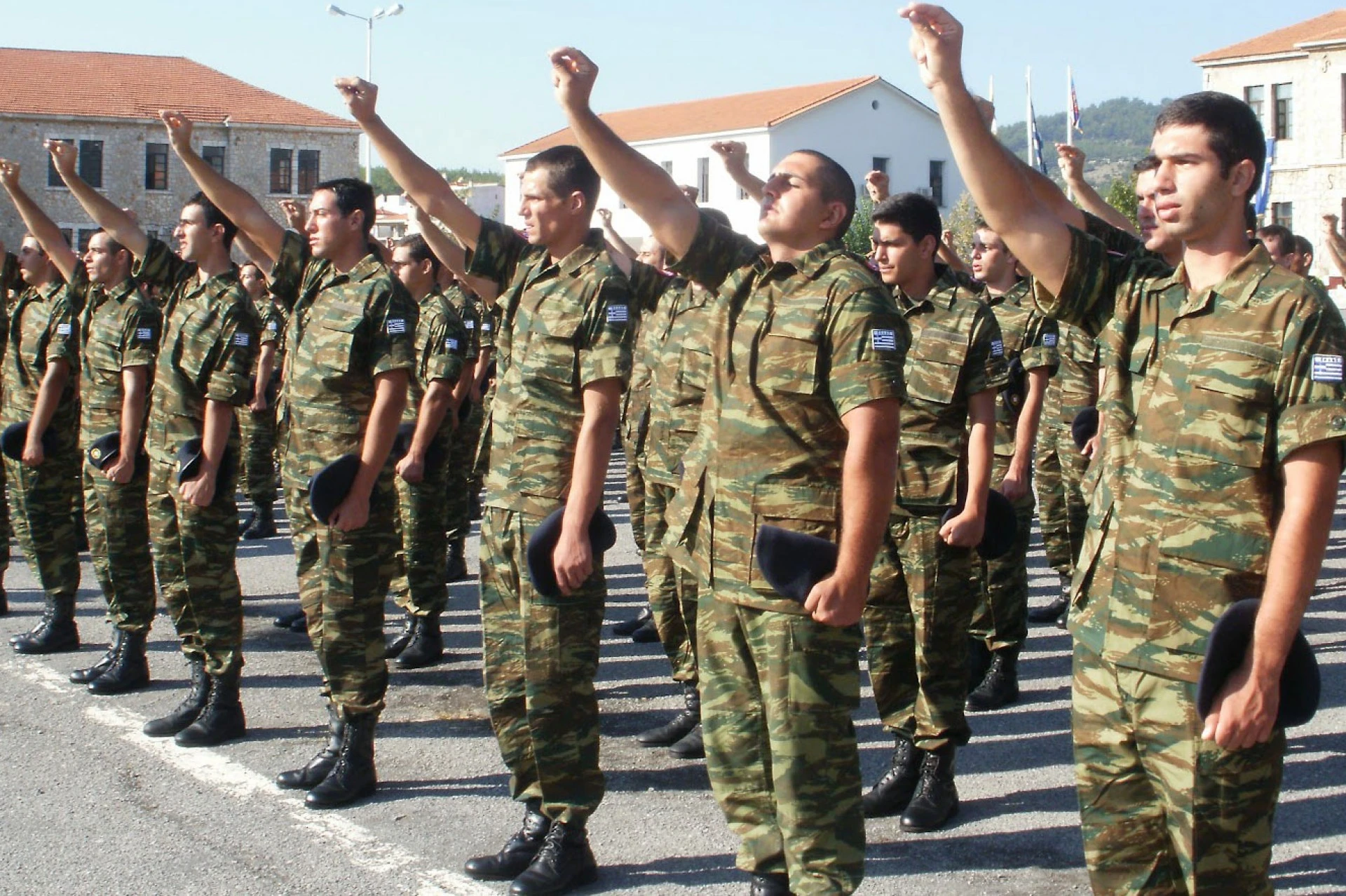 Greek Soldiers, doing sign of the Orthodox cross