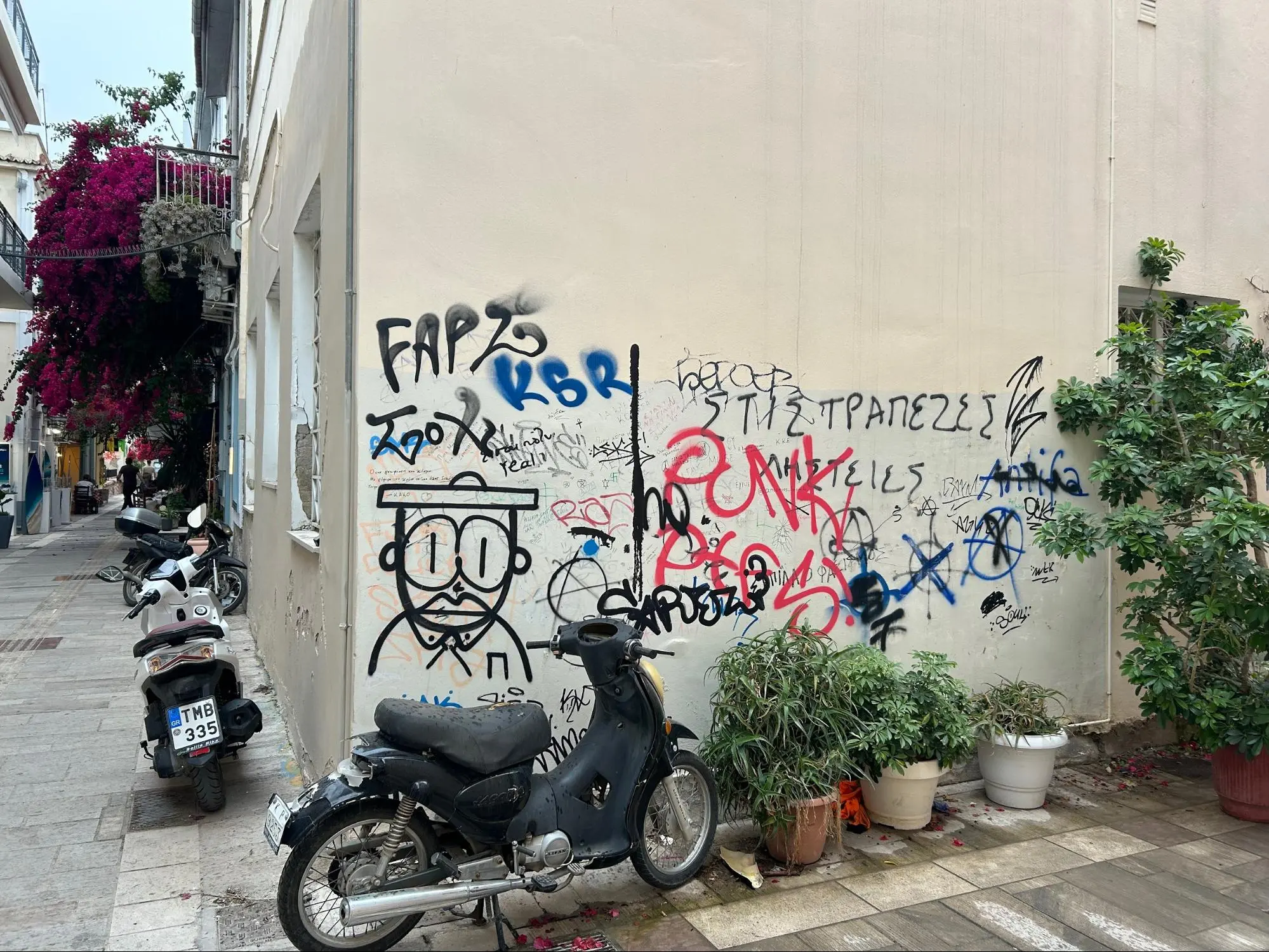 Nafplio, Greece in May 2025 with noticeably more graffiti than my last visit in 2023.